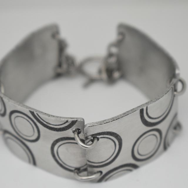 graduating circles aluminum idustrial bracelet.jpg